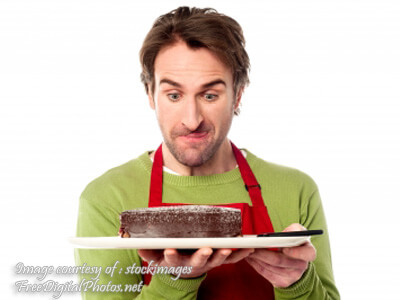 Chef Holding Chocolate Cake